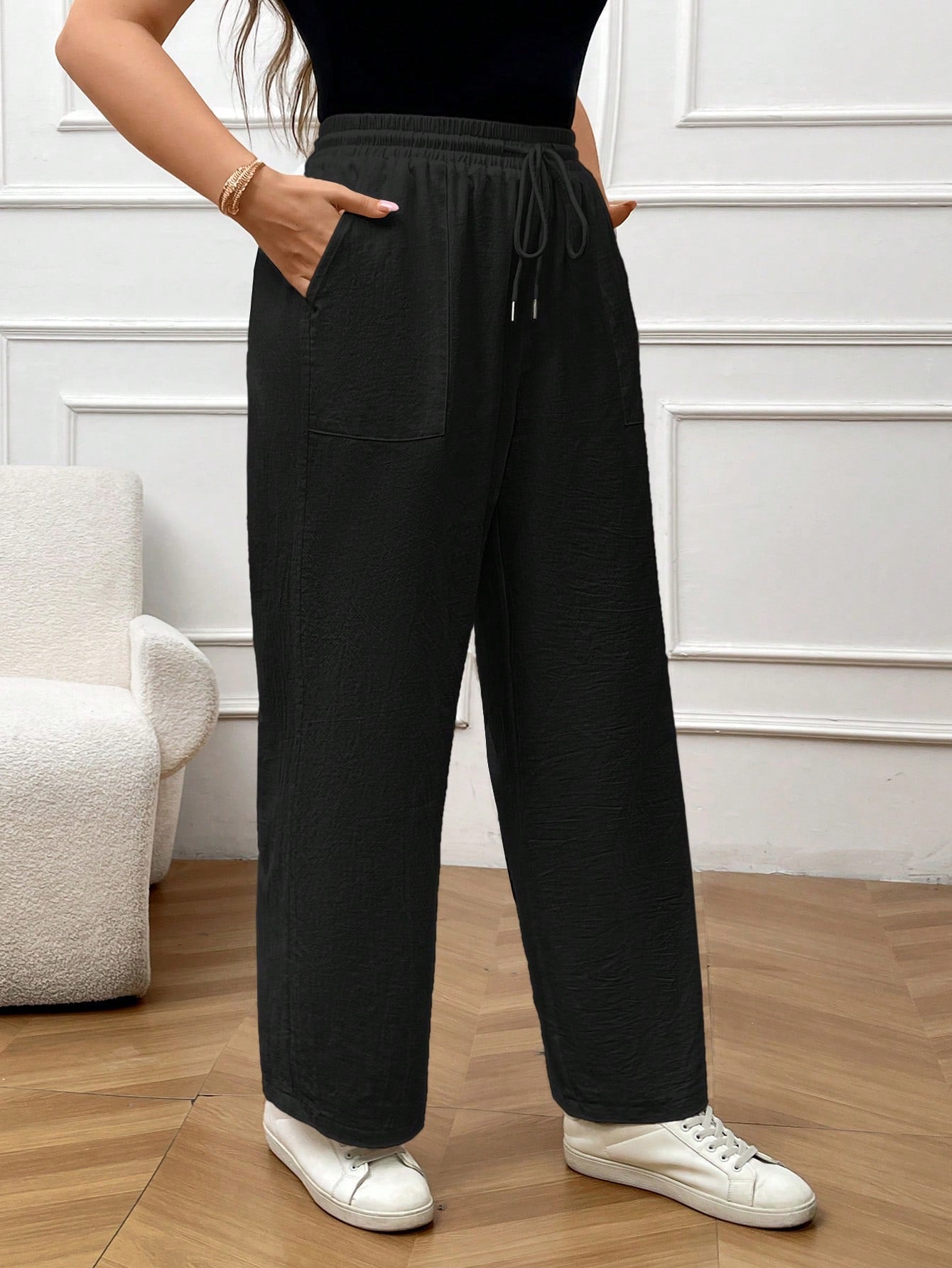 Calça feminina de linho com nó Bernadete. Plus Size